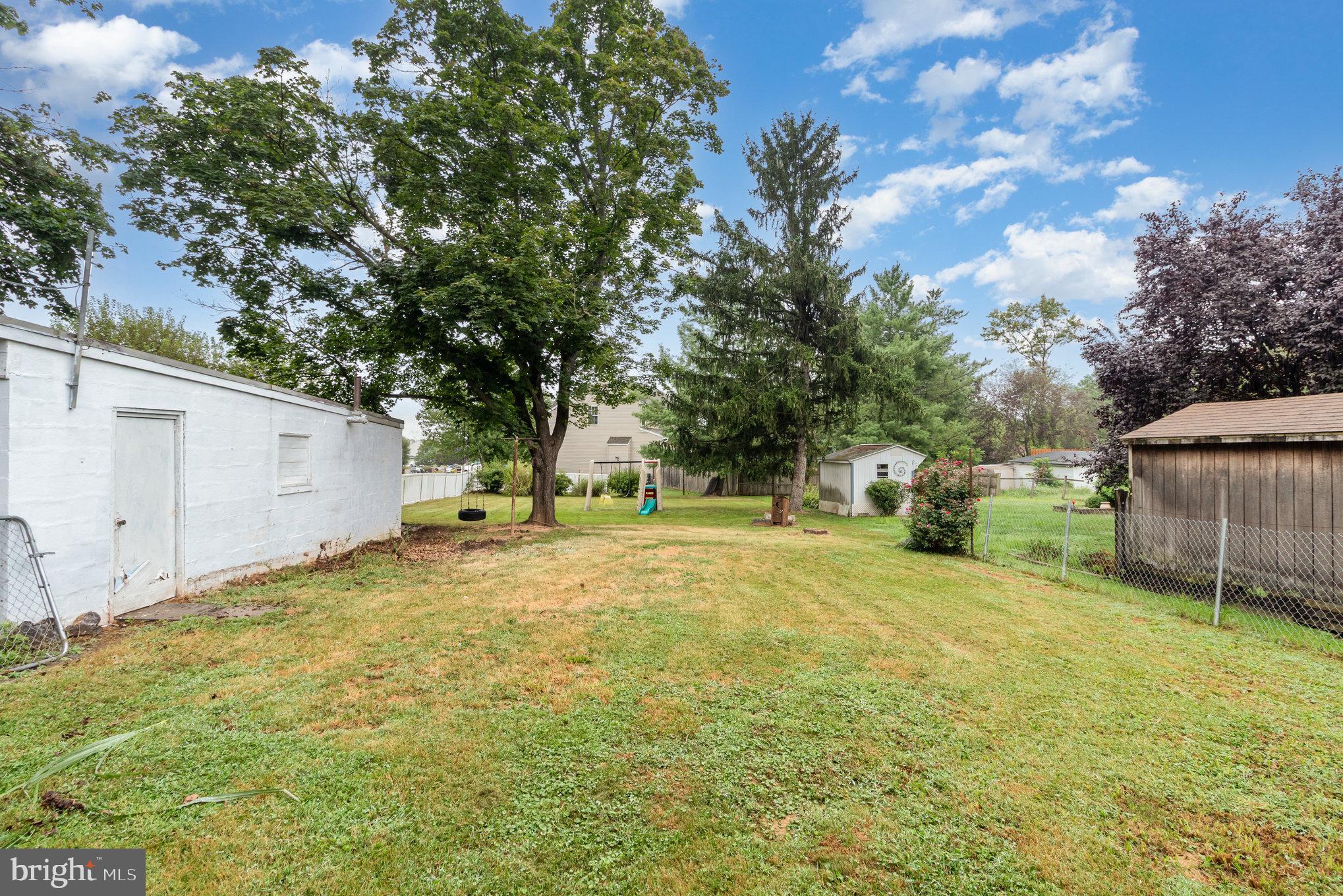 273 Copenhaffer Road York, PA 17404 - Photo 13 of 24 a view of a yard with a house and large tree