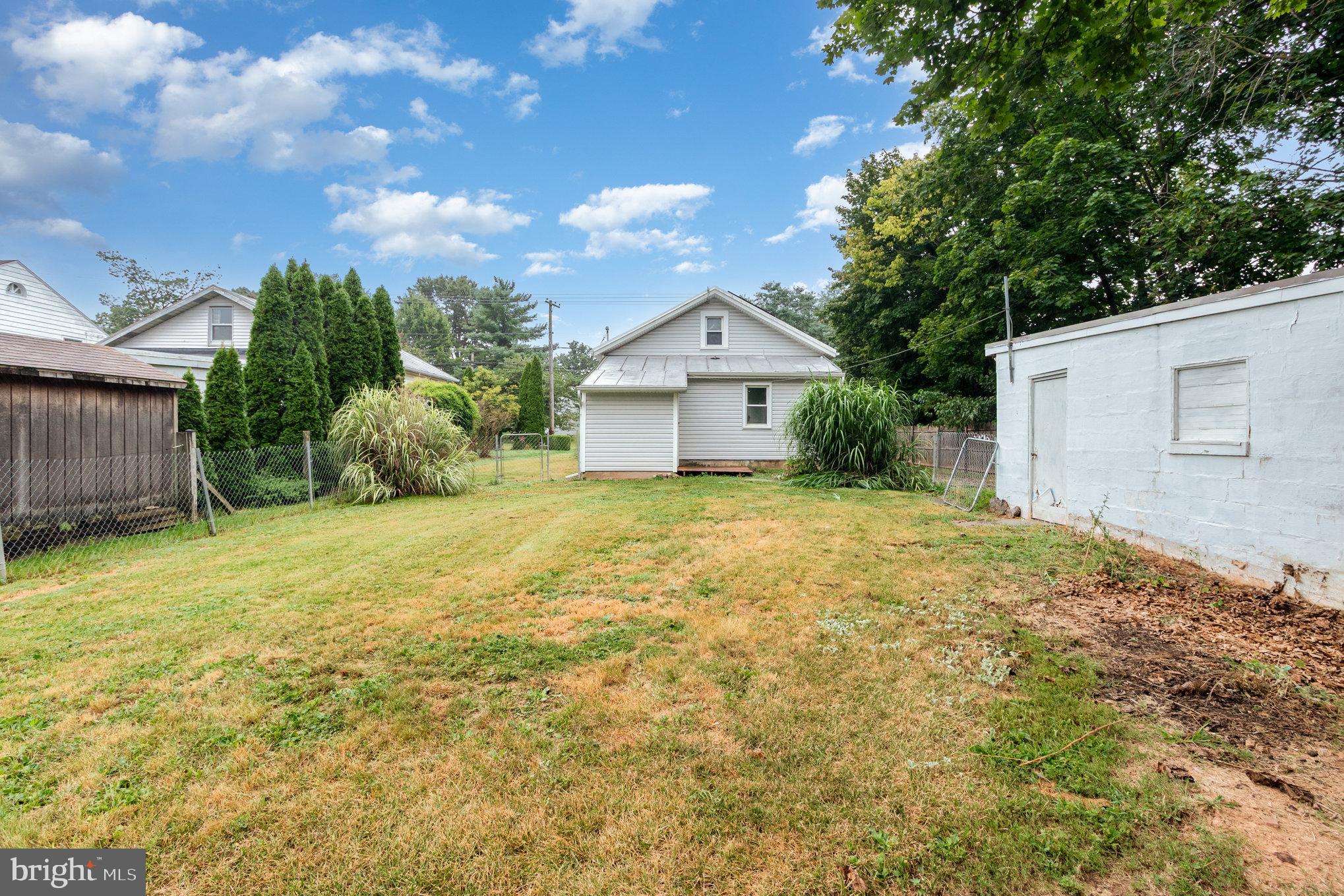 273 Copenhaffer Road York, PA 17404 - Photo 14 of 24 a view of a house with a yard and garage