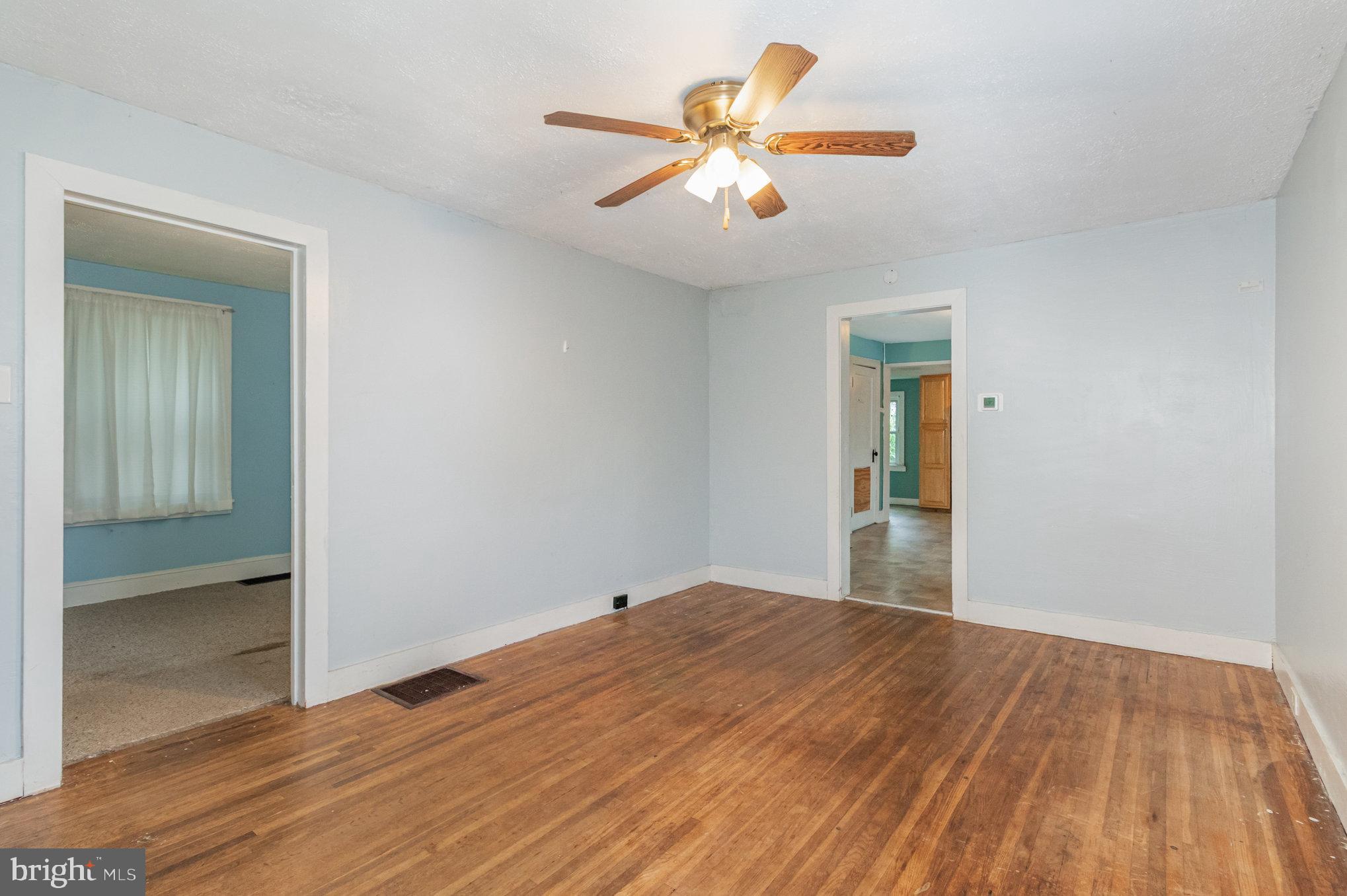 273 Copenhaffer Road York, PA 17404 - Photo 2 of 24 wooden floor in an empty room with a window