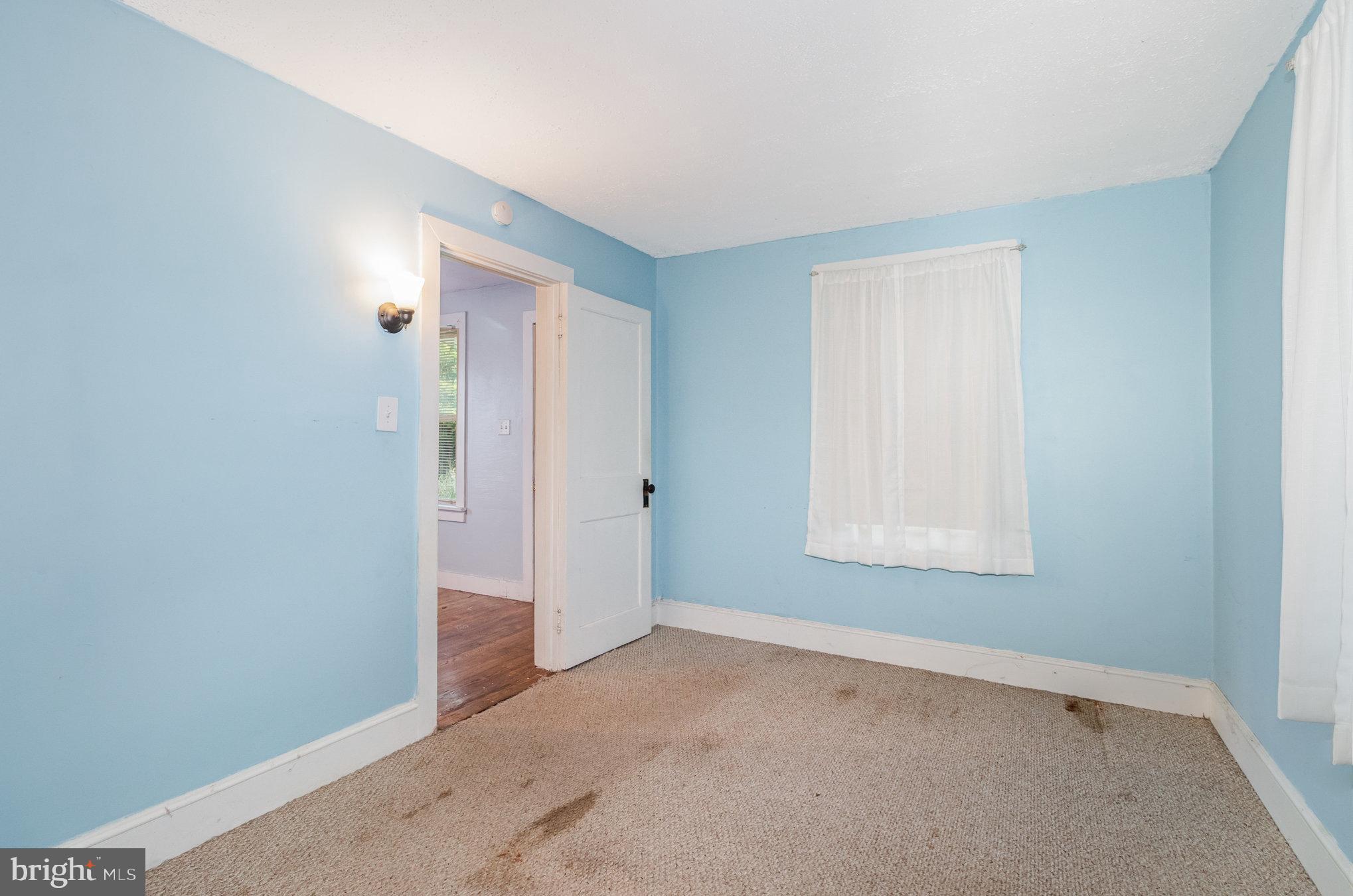 273 Copenhaffer Road York, PA 17404 - Photo 4 of 24 an empty room with windows and closet