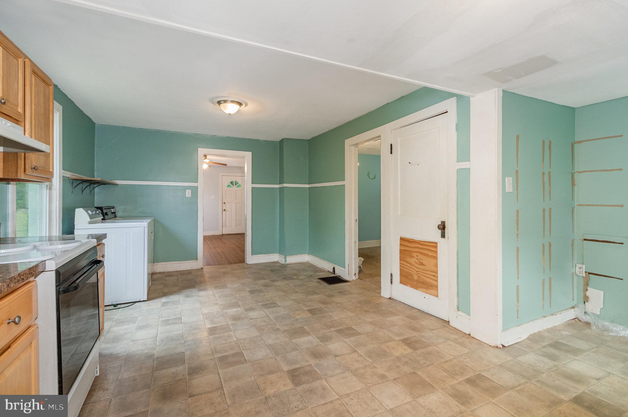 273 Copenhaffer Road York, PA 17404 - Photo 9 of 24 a view of a kitchen with furniture and a refrigerator
