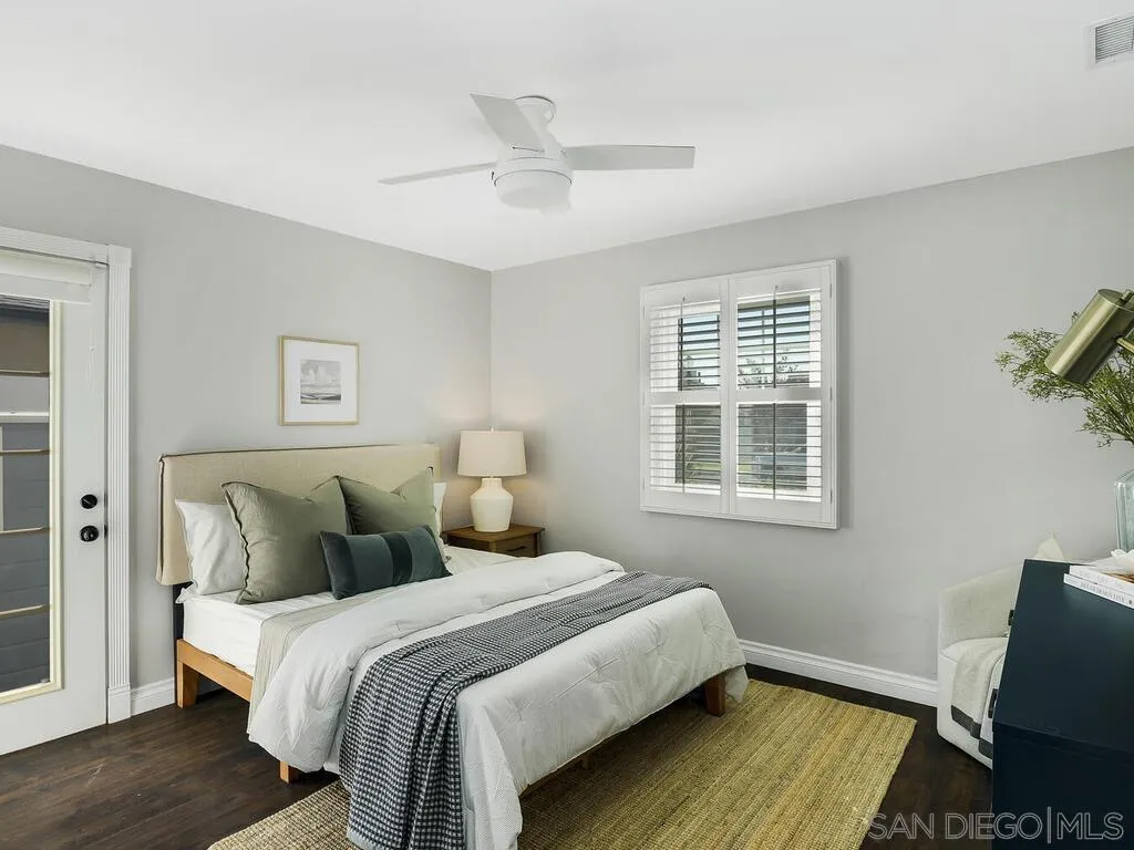 4751 Altadena Avenue San Diego, CA 92115 - Photo 18 of 47 a bedroom with bed and window