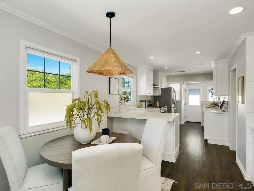 4751 Altadena Avenue San Diego, CA 92115 - Photo 8 of 47 a living room with furniture a window and kitchen view