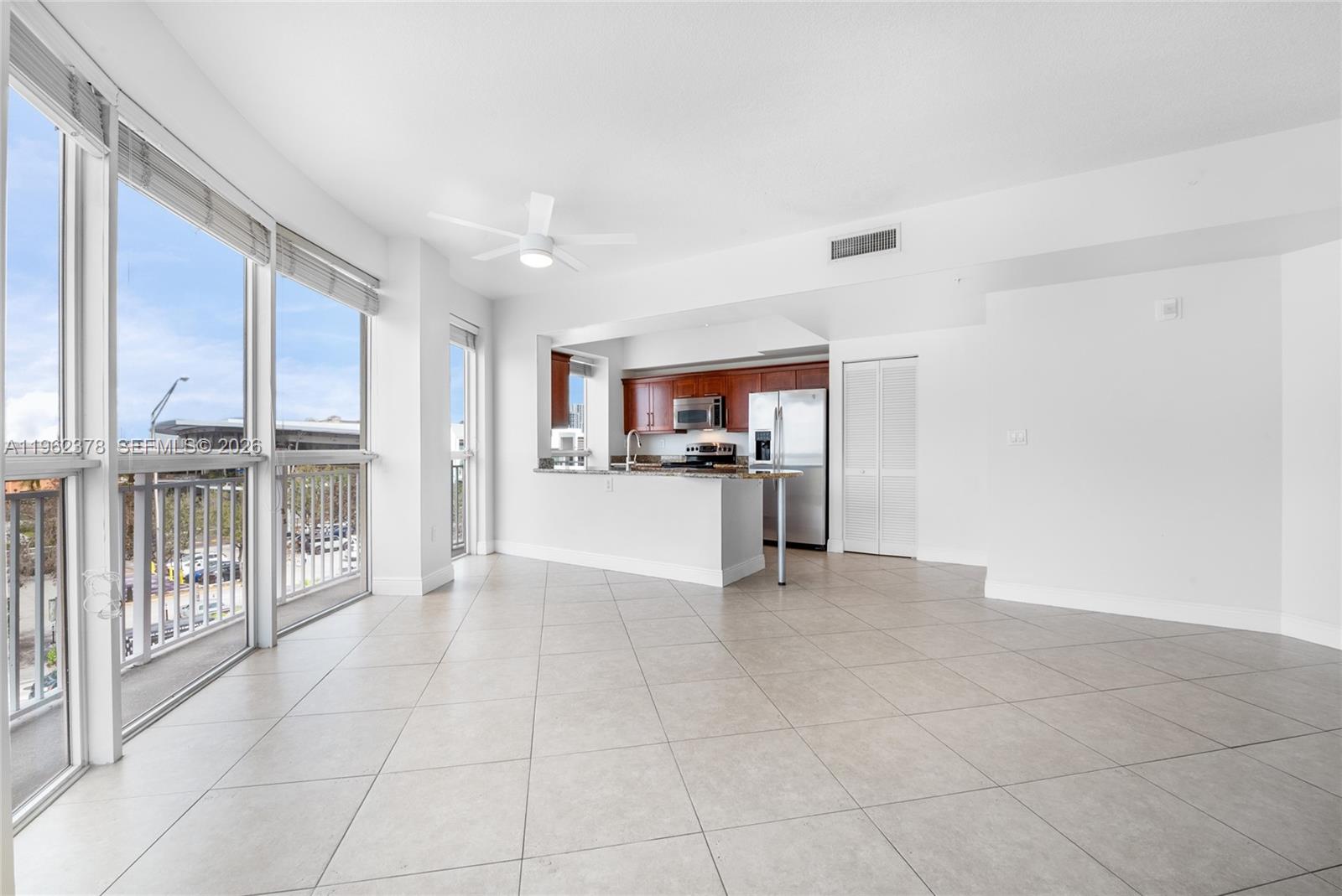 7270 Southwest 88th Street, Unit B303 Miami, FL 33156 - Photo 5 of 15 a view of a kitchen with a sink and a dishwasher
