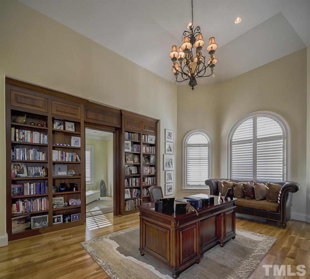 1504 Barony Lake Way Raleigh, NC 27614 - Photo 14 of 25 a living room with furniture a rug and a large window