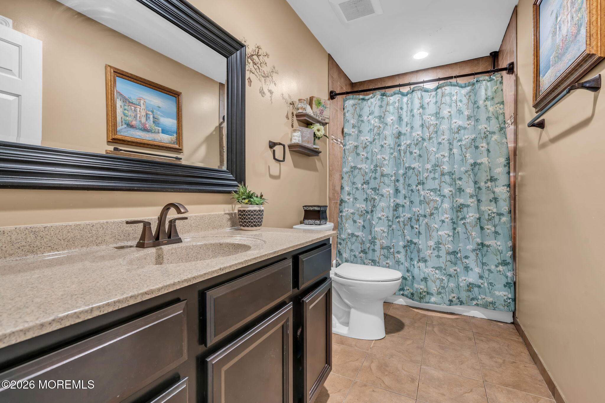 21 Ryan Road Marlboro, NJ 07746 - Photo 26 of 56 a bathroom with a granite countertop sink a toilet and a mirror
