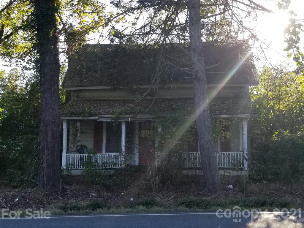 2601 Highway 64 Rutherfordton, NC 28139 - Photo 1 of 3 a front view of a house with garden