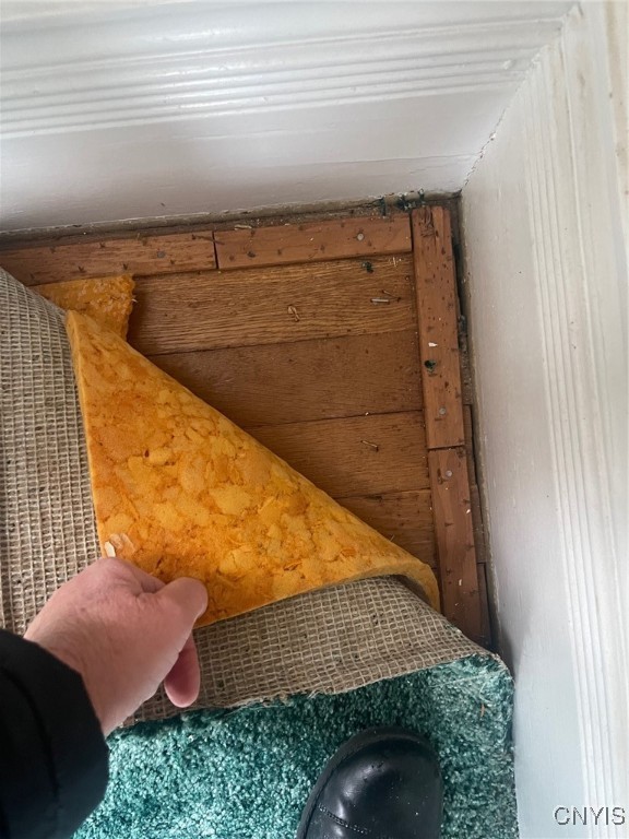 322 North Main Street Lenox, NY 13032 - Photo 13 of 33 Hardwood floor under living room carper