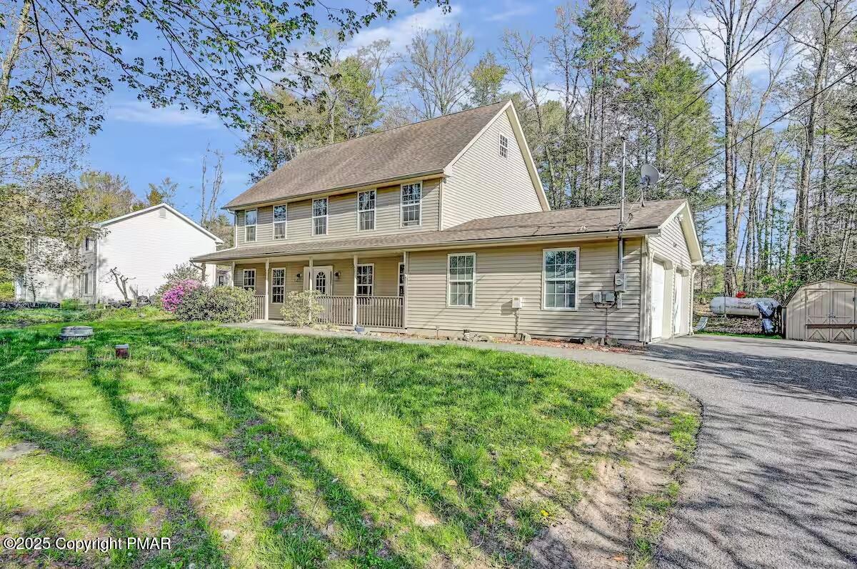 121 Lidio Road Blakeslee, PA 18610 - Photo 1 of 1 a view of a yard in front of house