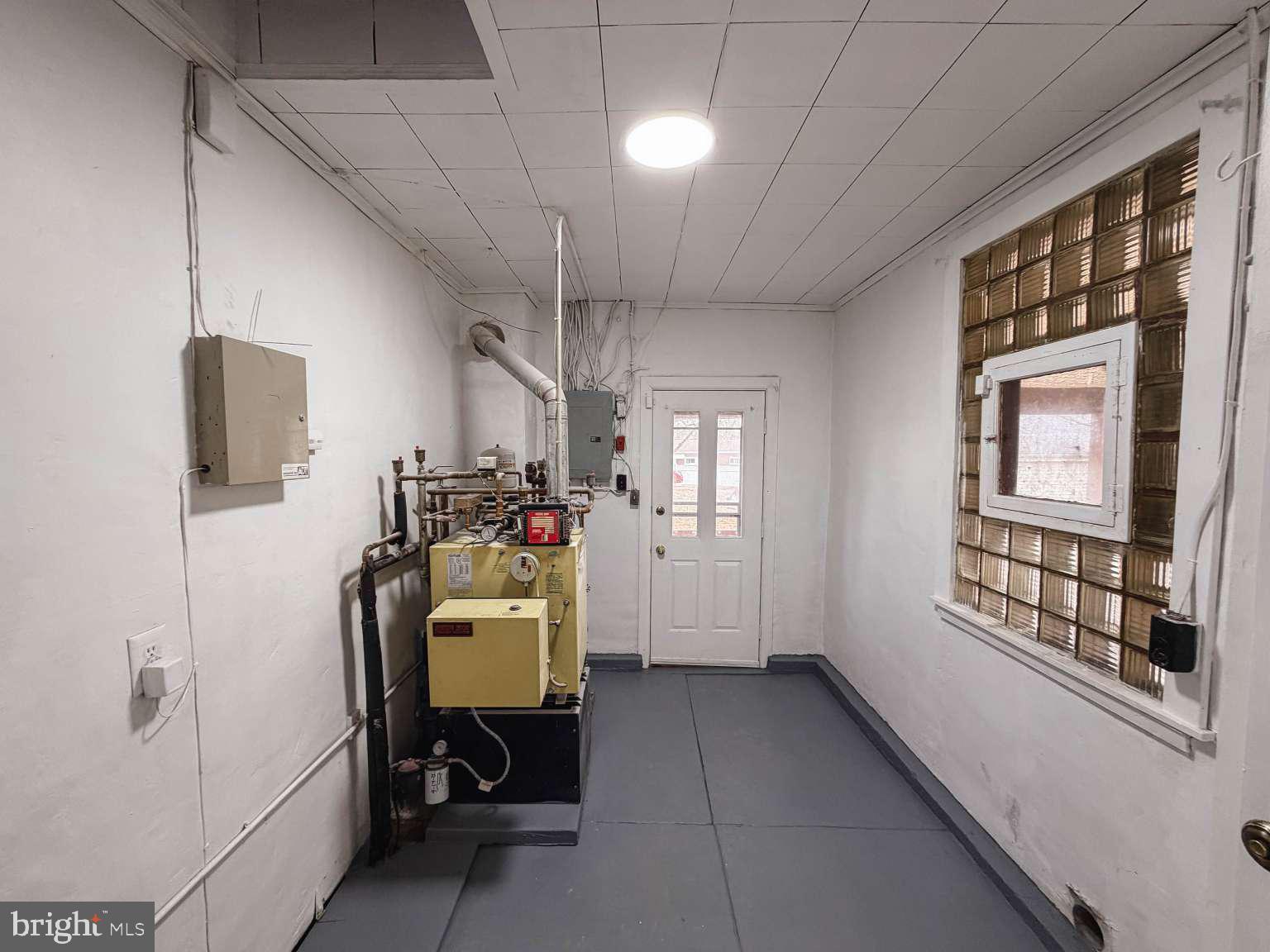 1424 Wayne Street Reading, PA 19601 - Photo 12 of 19 a room with furniture and window