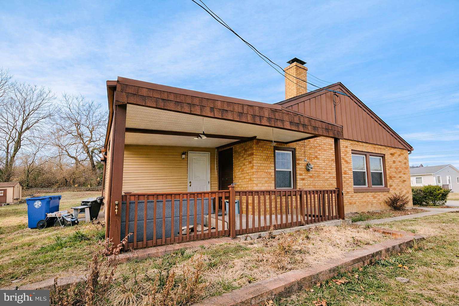 1424 Wayne Street Reading, PA 19601 - Photo 18 of 19 a view of a house with wooden fence