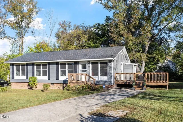 front view of a house with a yard