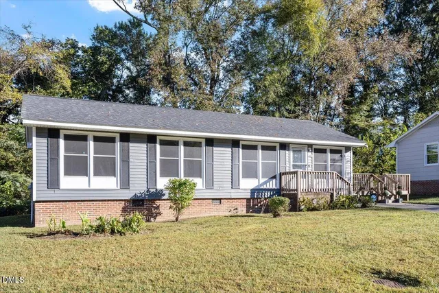 a house view with a garden space