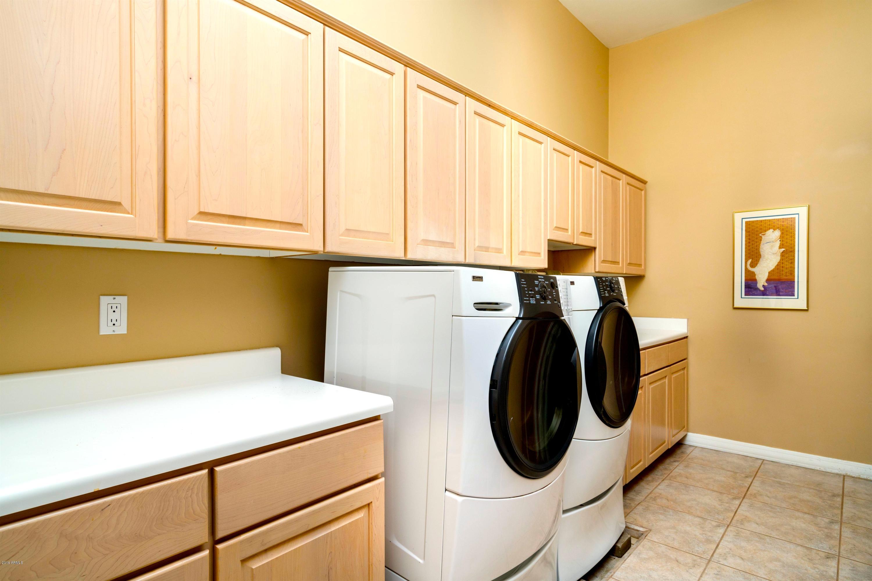 1101 East Warner Road, Unit 137 Tempe, AZ 85284 - Photo 29 of 37 Laundry Room with Full Fridge/Freezer