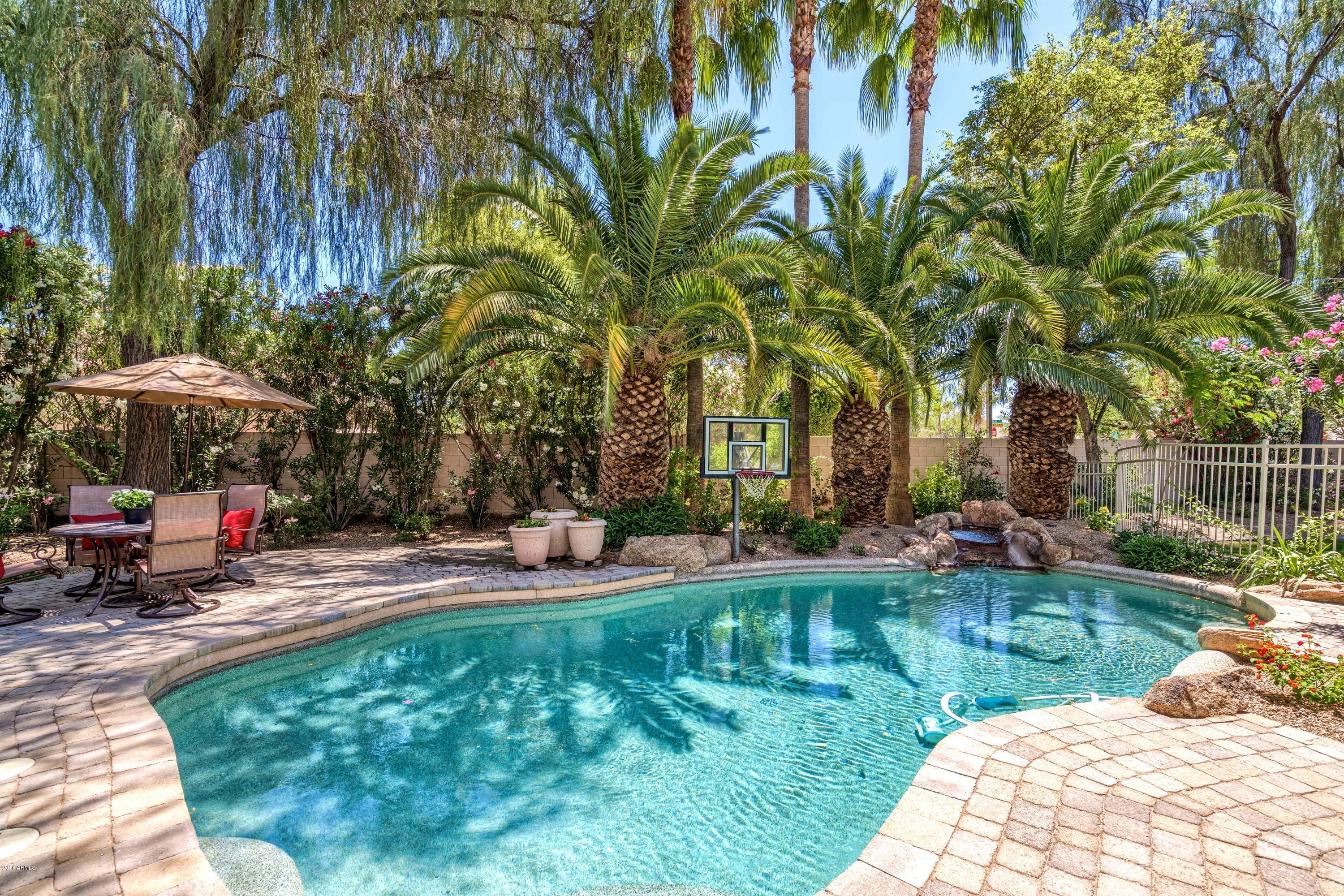 1101 East Warner Road, Unit 137 Tempe, AZ 85284 - Photo 4 of 37 Pool with waterfall