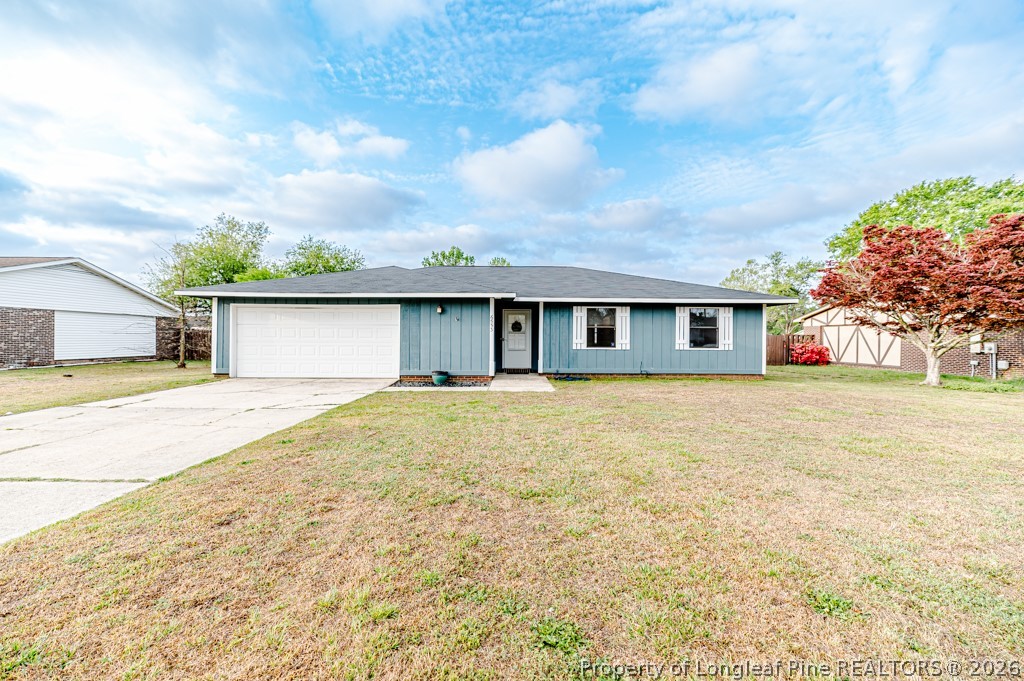 6553 Grist Mill Road Fayetteville, NC 28314 - Photo 1 of 31 a front view of house with yard
