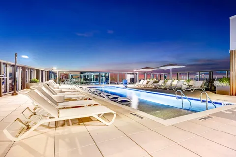 a outdoor space with swimming pool and furniture