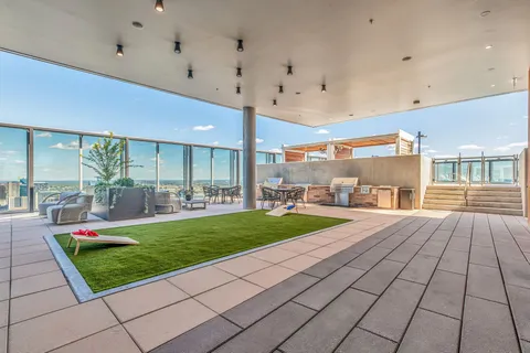 a view of a patio with a backyard