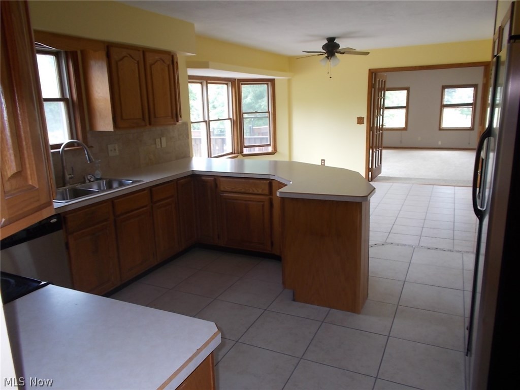52710 Trinter Road Vermilion, OH 44089 - Photo 5 of 35 Ceraminc tile throughout the kitchen/eat in kitchen.