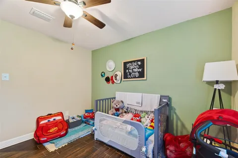 a living room with baby toys