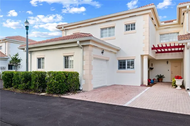 a view of a city with an ocean view