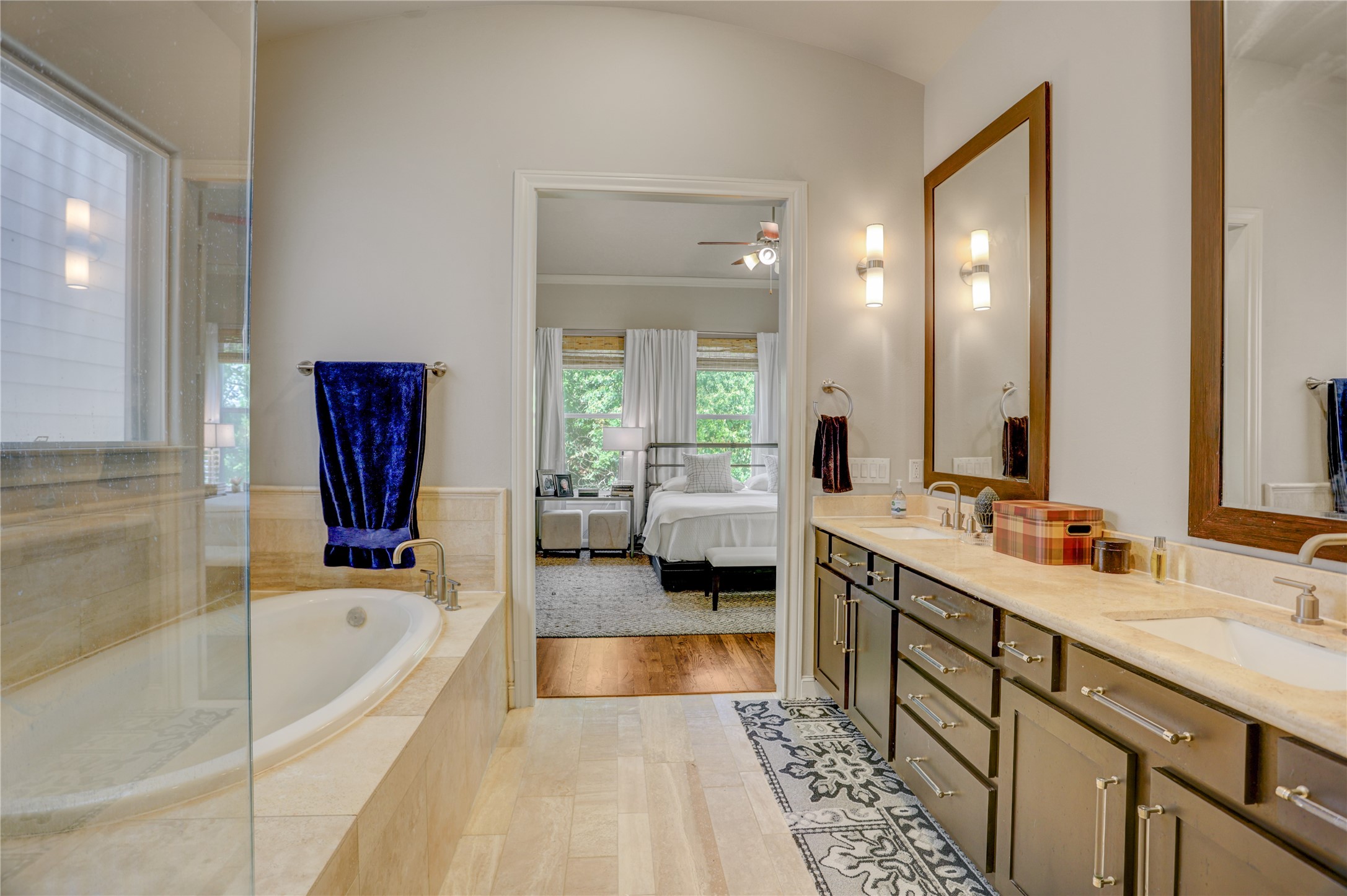 4124 Bonner View Lane Houston, TX 77007 - Photo 17 of 31 The primary bath has double sinks, stone counter and custom mirrors.