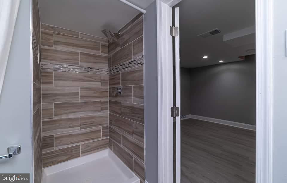 310 Marydell Road Baltimore, MD 21229 - Photo 22 of 26 a view of walk in closet with empty racks