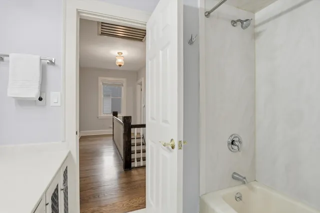 a bathroom with a sink toilet and vanity