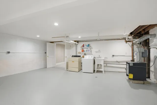 a view of a deck with furniture and trees