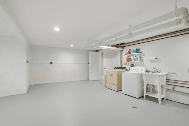 a view of a two chairs in the balcony