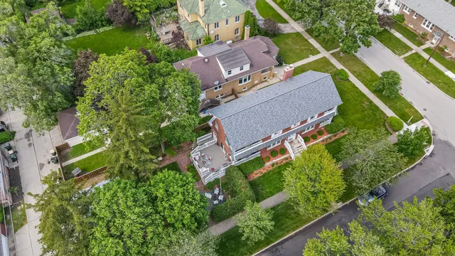 an aerial view of a house with a garden