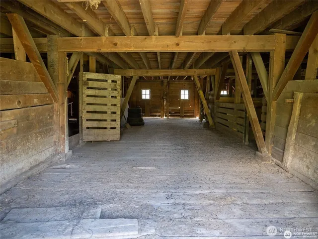 a view of empty room with stairs