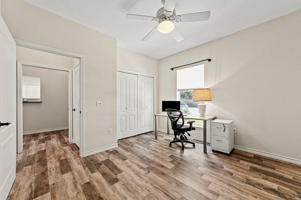 1008 Edinburgh Drive Kerrville, TX 78028 - Photo 14 of 25 a view of a workspace with furniture and a window