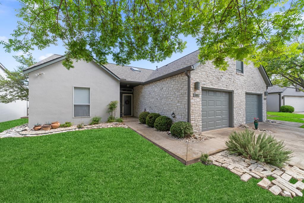 1008 Edinburgh Drive Kerrville, TX 78028 - Photo 2 of 25 a front view of house with yard and green space
