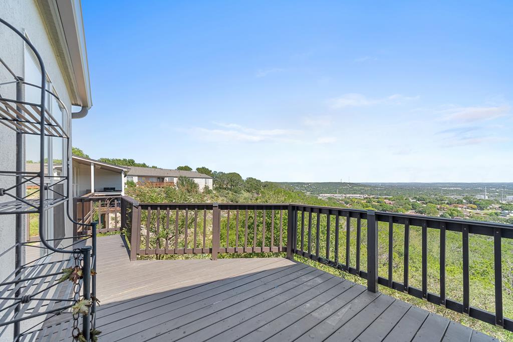 1008 Edinburgh Drive Kerrville, TX 78028 - Photo 22 of 25 a view of a balcony with lake view and mountain view