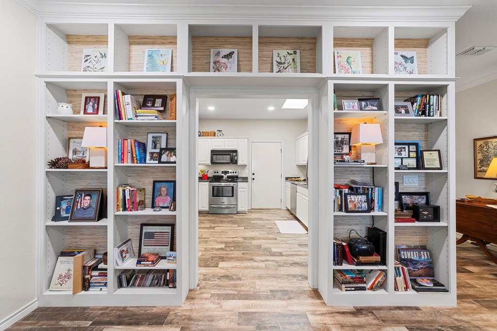 1008 Edinburgh Drive Kerrville, TX 78028 - Photo 10 of 25 a view of a workspace with bookshelf