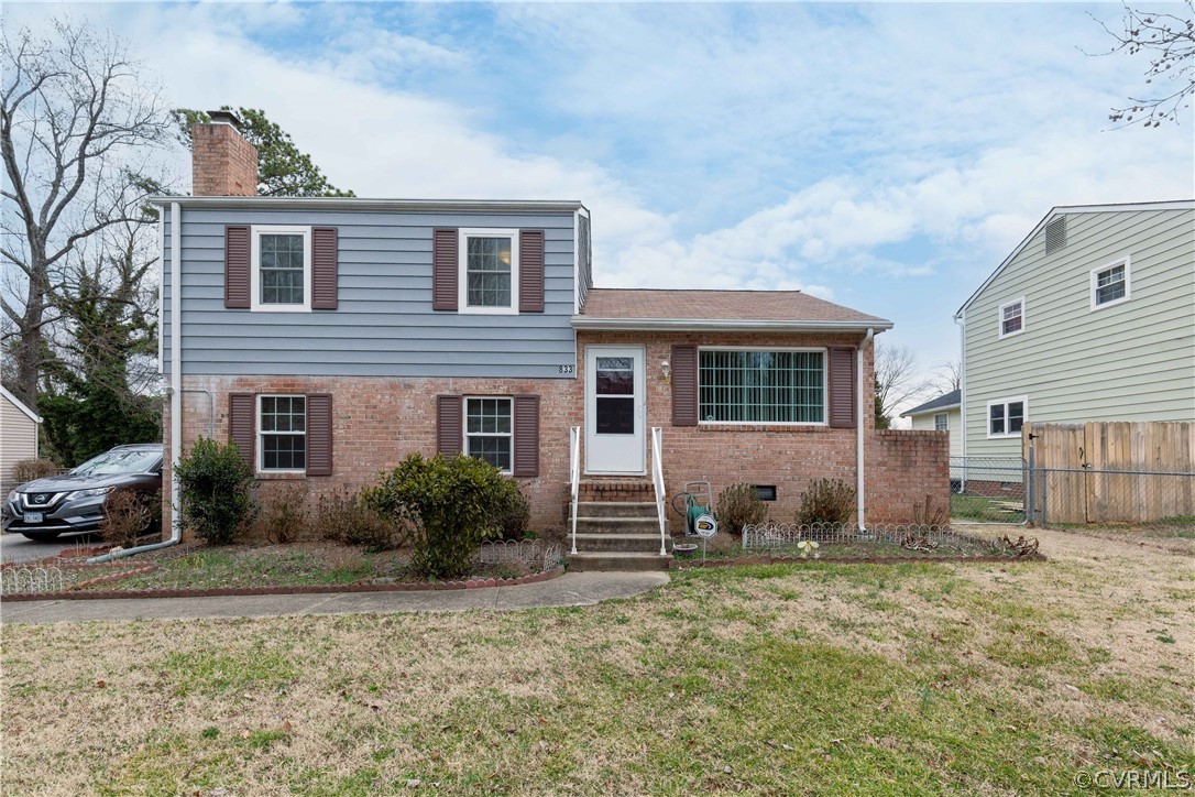 833 Adkins Road Chesterfield, VA 23236 - Photo 5 of 30 a front view of a house with garden