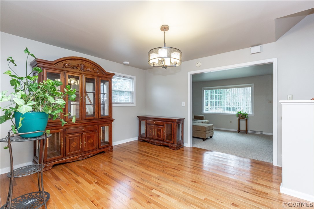 833 Adkins Road Chesterfield, VA 23236 - Photo 8 of 30 a living room with furniture and a wooden floor