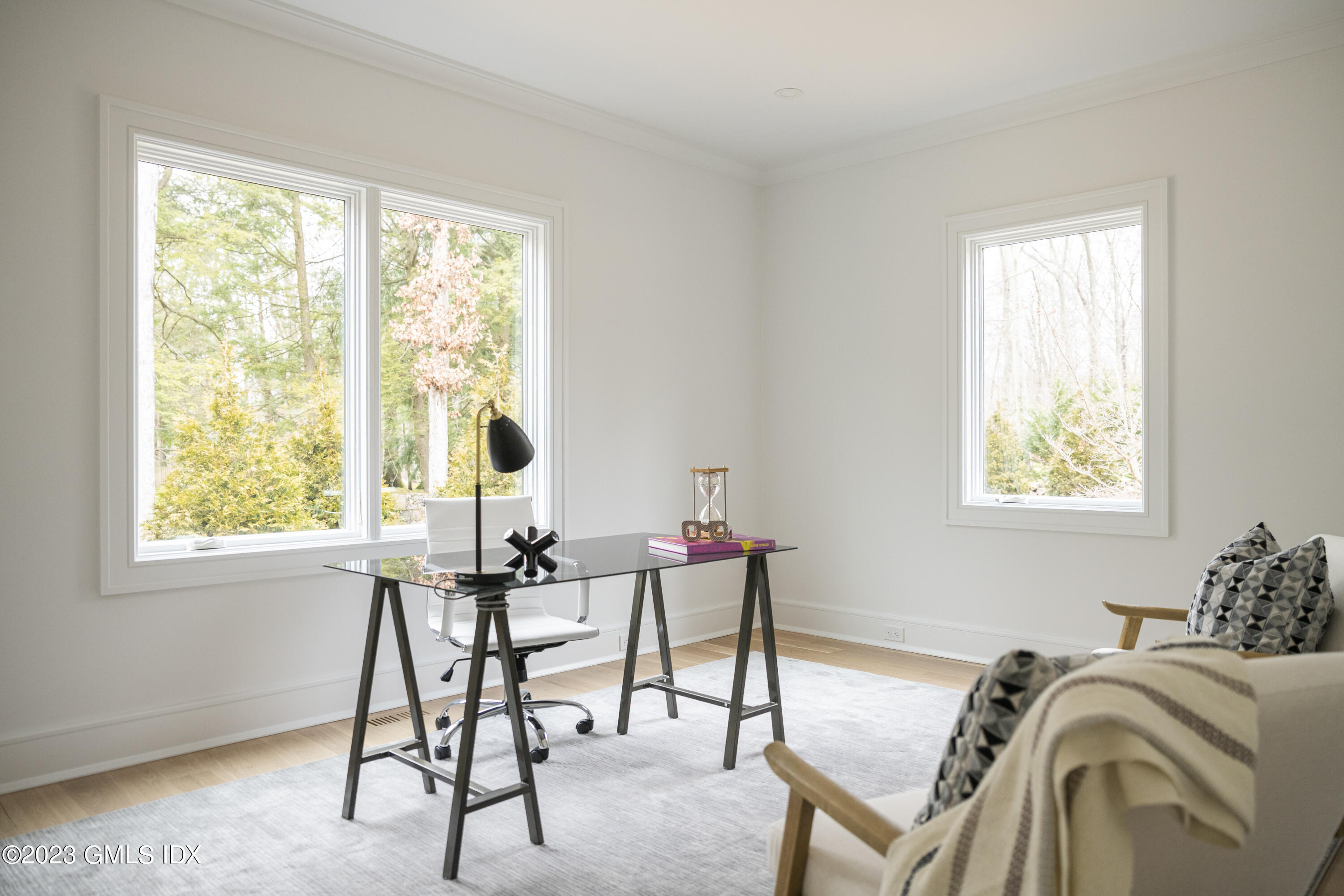 261 Cognewaugh Road Cos Cob, CT 06807 - Photo 7 of 38 a view of a workspace room with furniture and windows