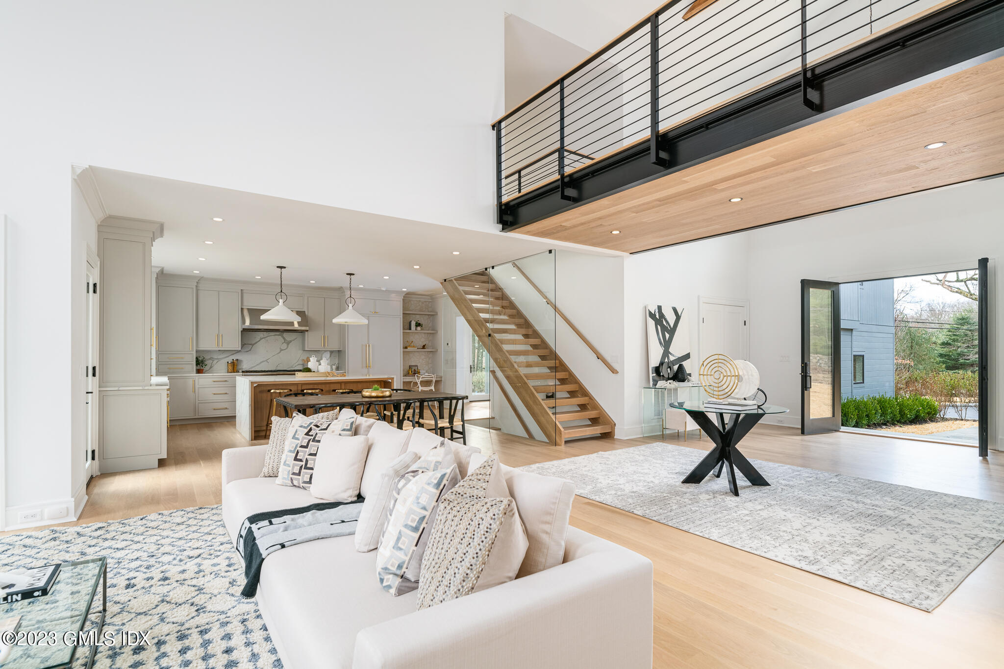 261 Cognewaugh Road Cos Cob, CT 06807 - Photo 8 of 38 a view of living room with furniture and floor to ceiling window