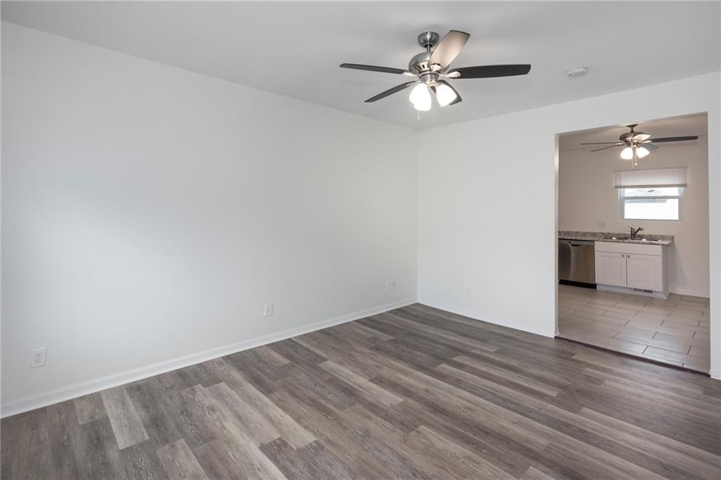 1101 2nd Avenue Coraopolis, PA 15108 - Photo 11 of 26 wooden floor in an empty room with a window
