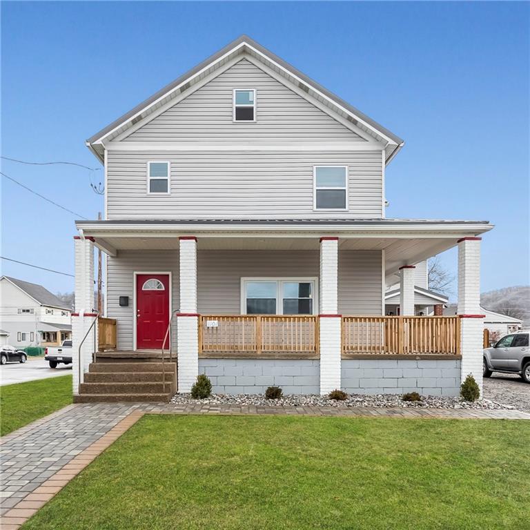 1101 2nd Avenue Coraopolis, PA 15108 - Photo 26 of 26 a front view of a house with a yard
