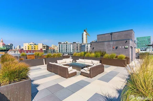 a view of building with outdoor seating