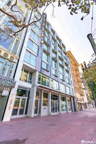 a view of a city with tall buildings