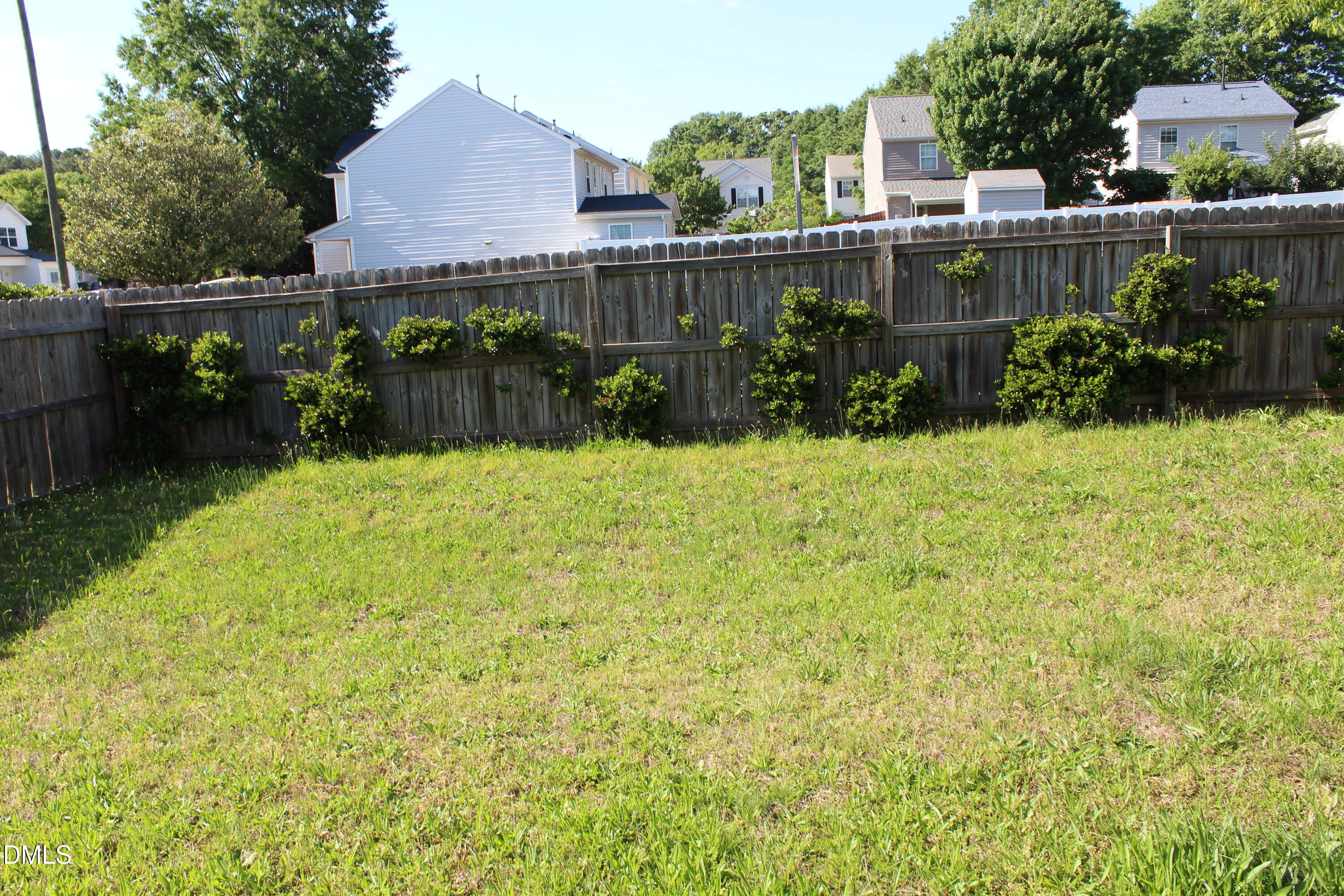4305 Standing Rock Way Raleigh, NC 27604 - Photo 6 of 11 a view of a garden