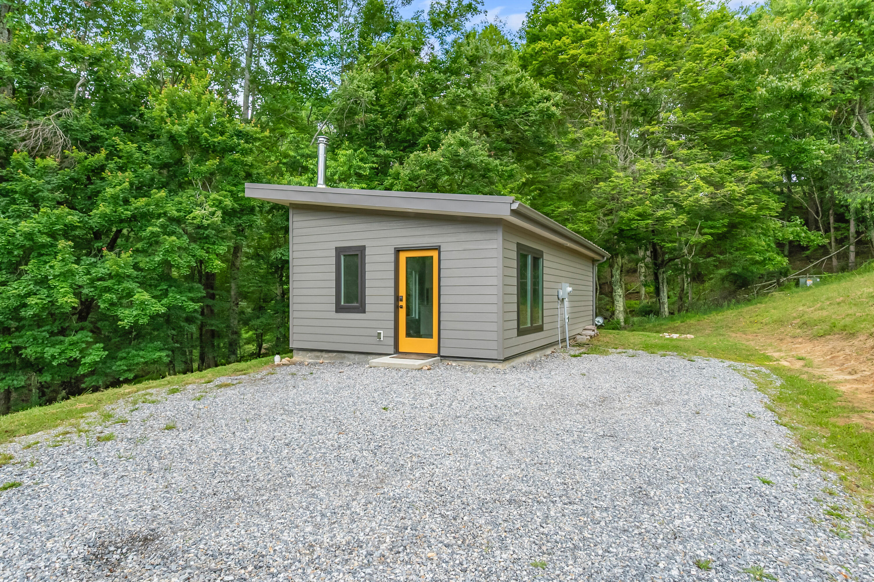 133 Wonder Way Northeast Pilot, VA 24138 - Photo 20 of 57 a view of a house with backyard and garden