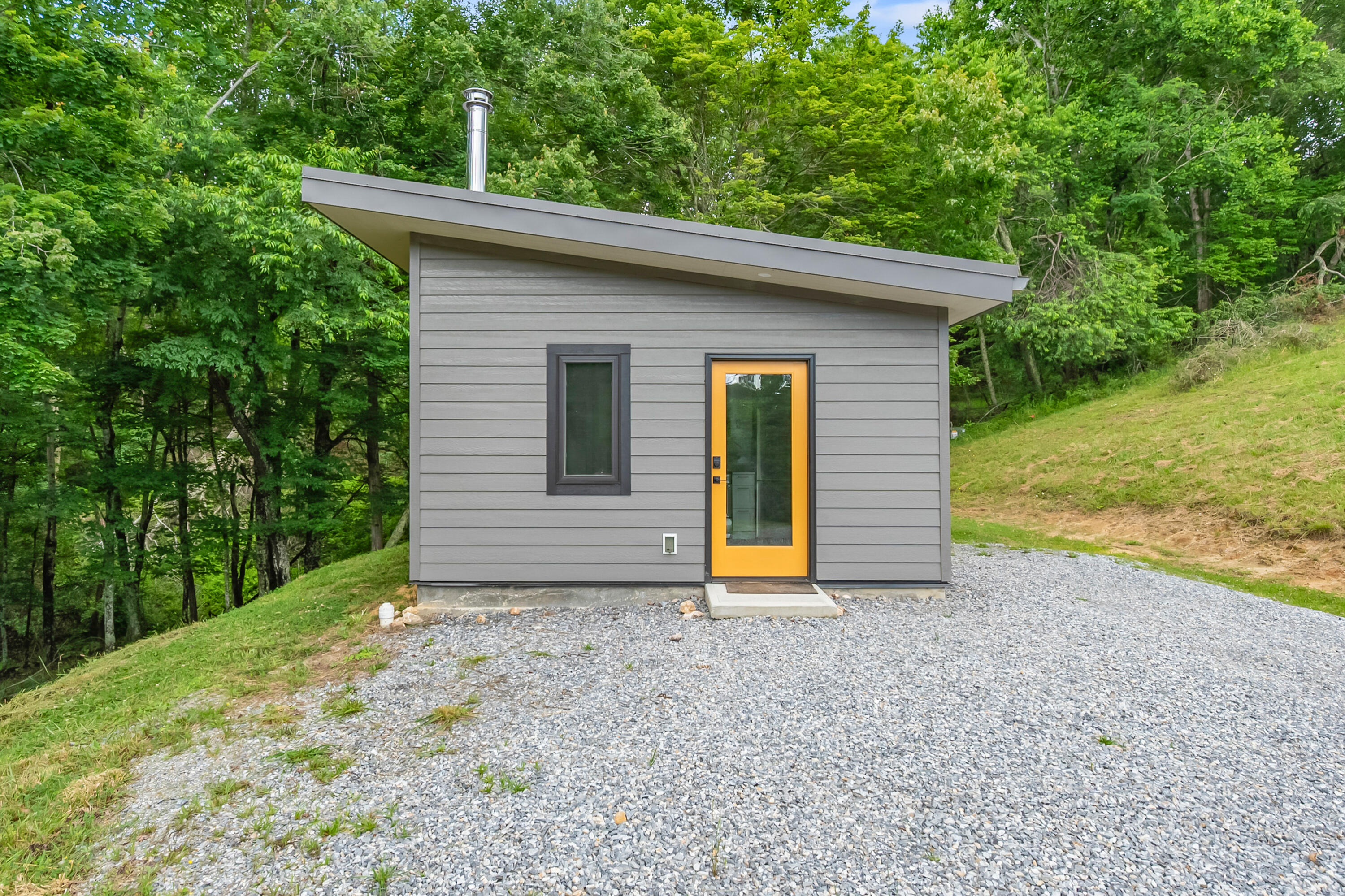 133 Wonder Way Northeast Pilot, VA 24138 - Photo 2 of 57 a view of a house with backyard and garden