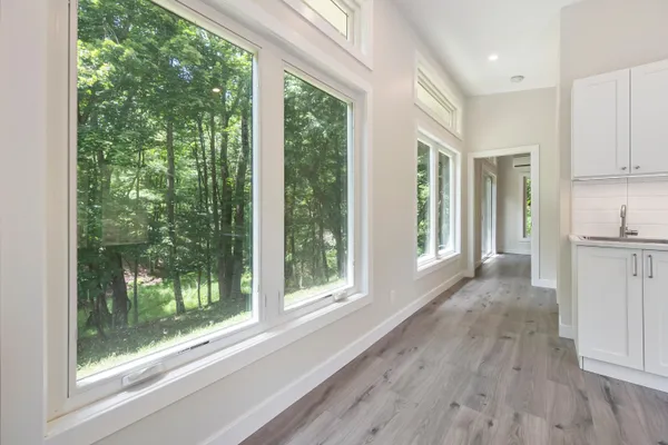 a view of a room with a large window