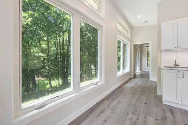 a view of a room with a large window