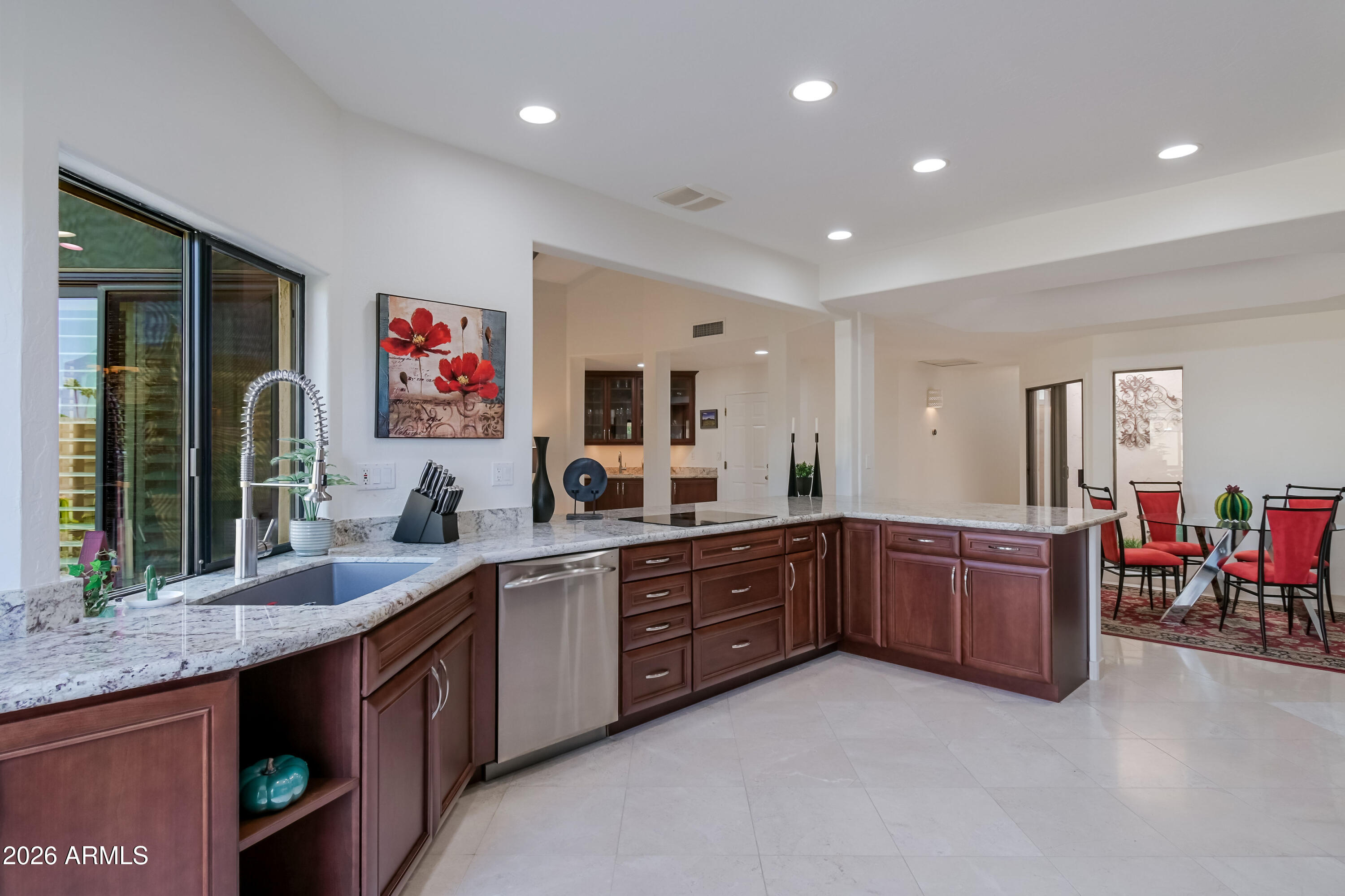 7955 East Chaparral Road, Unit 62 Scottsdale, AZ 85250 - Photo 1 of 38 a kitchen with lots of counter top space